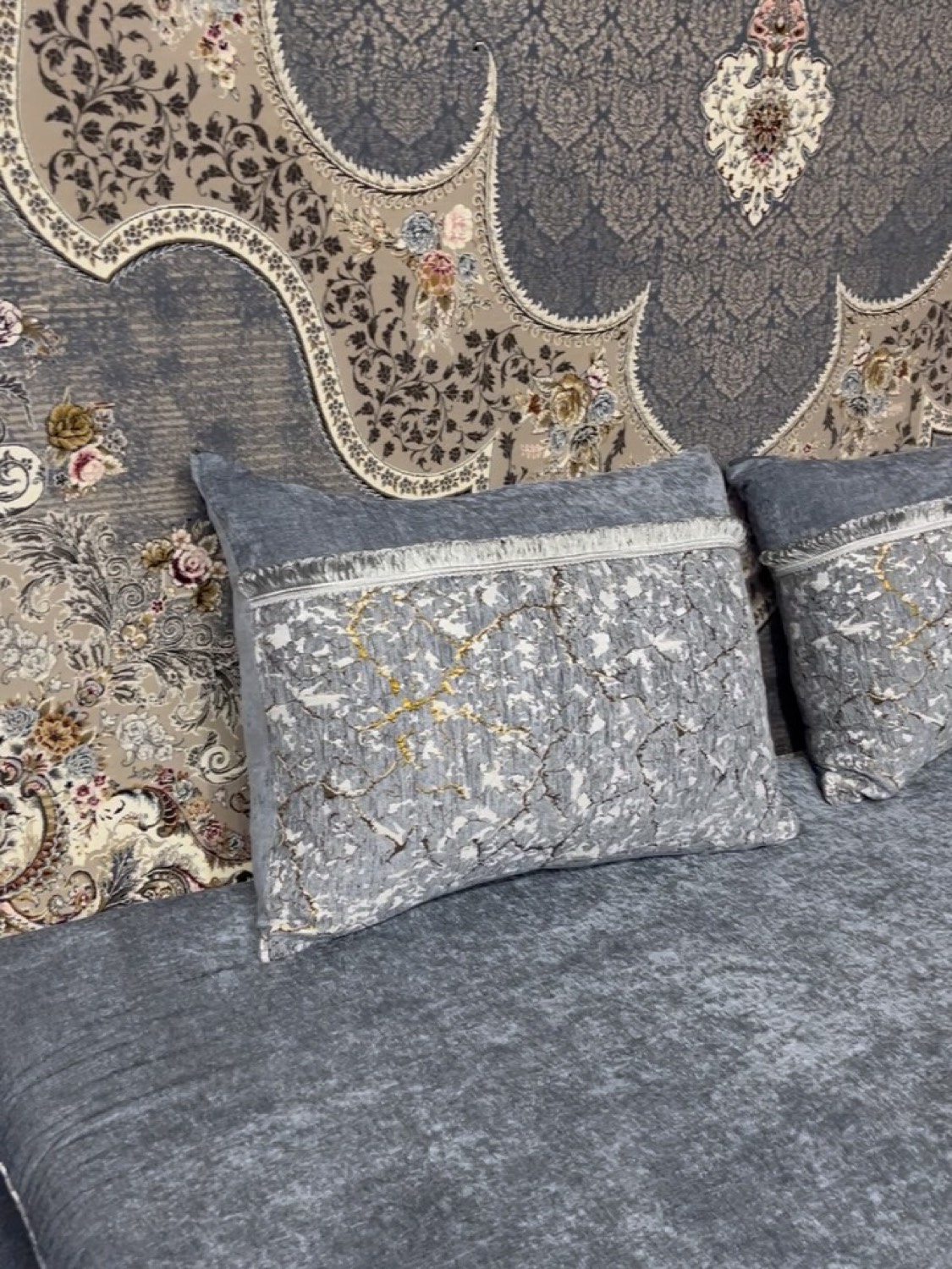 Ash-grey Persian rug with rose and cream detail