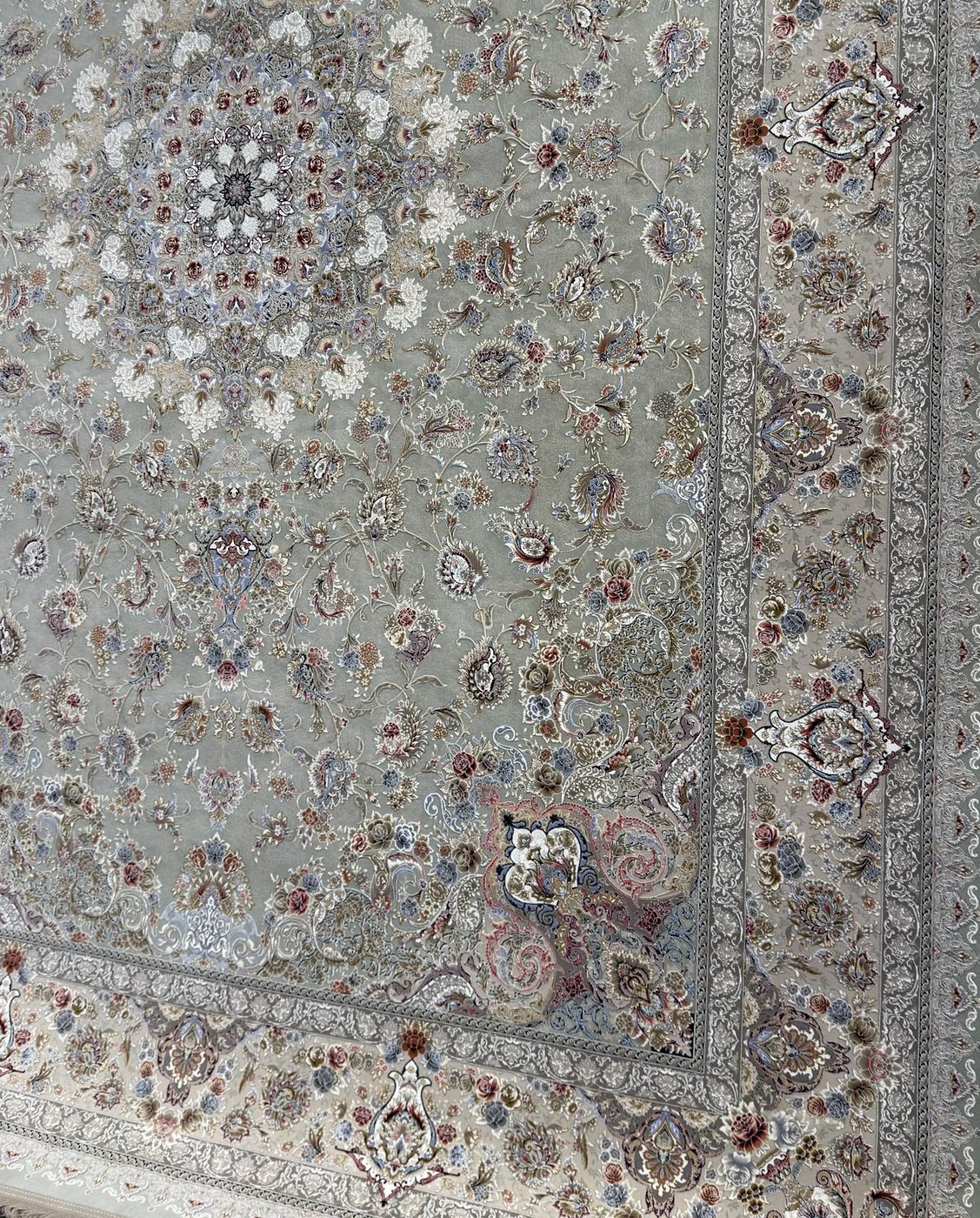 A 1500 reed Persian rug in soft sage, the weave fine enough to read like embroidery