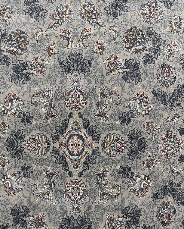 A 1200 reed rug in silver grey, its floral field woven fine enough to soften at arm's length