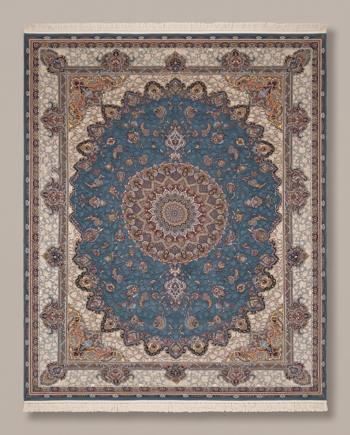 Persian rug with blue floral medallion on cream